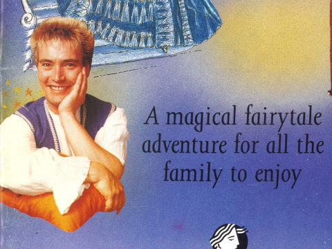 Performer Billy Pearce on a blue and yellow poster for Cinderella in 1993